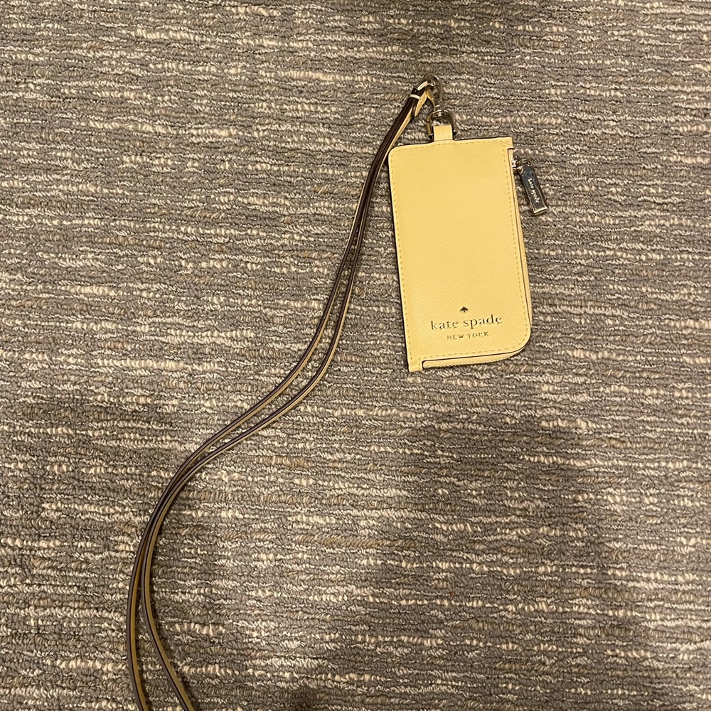 Kate Spade light yellow lanyard GREAT condition. Smoke free home